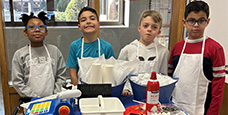  Students deliver hot chocolate to McKenna Staff